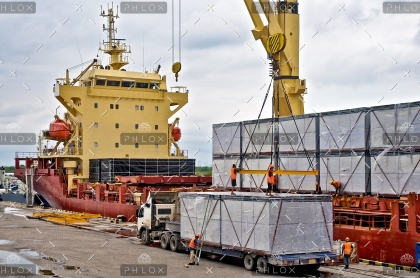 demo-attachment-23-loading-cargo-into-the-ship-in-harbor-PF86726
